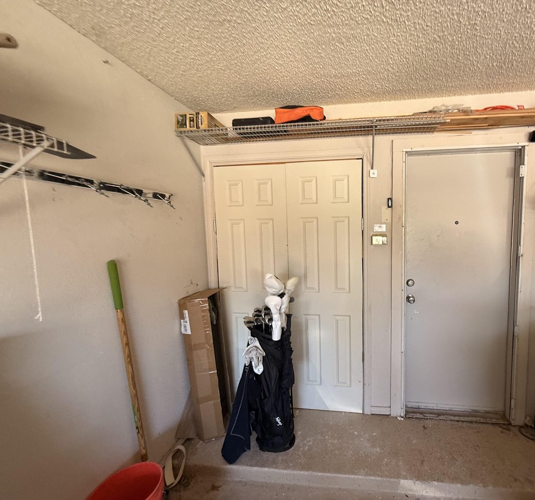 Real garage wall after items have been reduced and reset